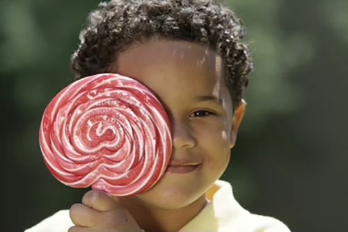 boy-holding-large-lolipop